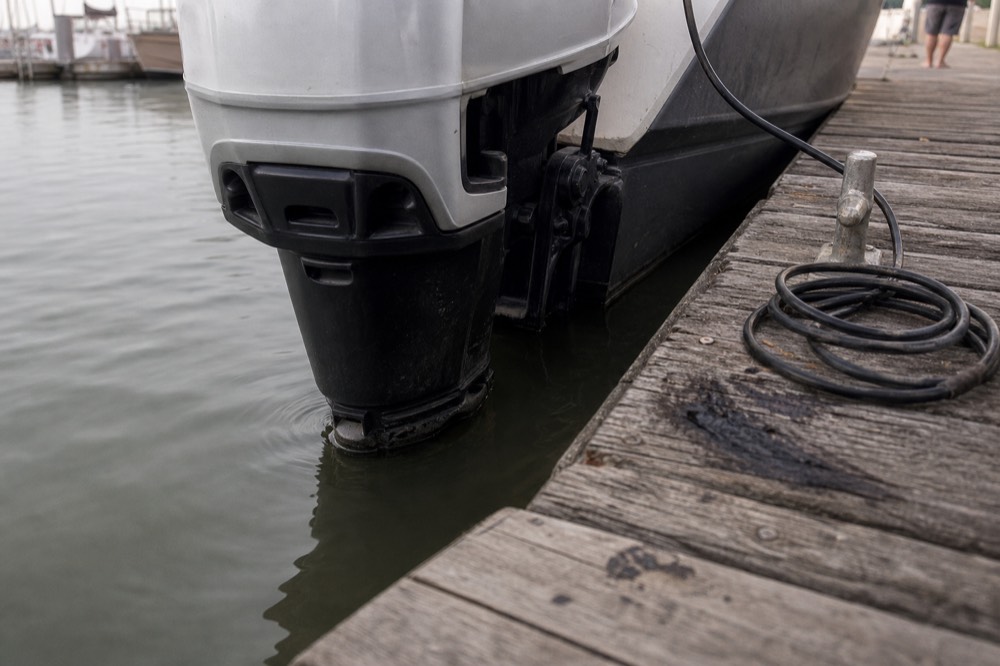Electric boat engine and quiet Seine waters, no text, no logos, no people